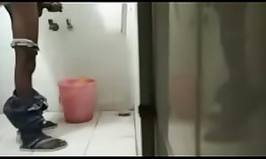 colleague masturbating in office bathroom while talking to his lover