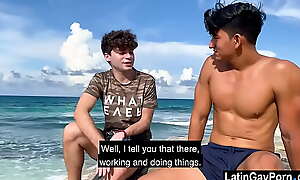 Latin elated boys low strongest to a catch beach